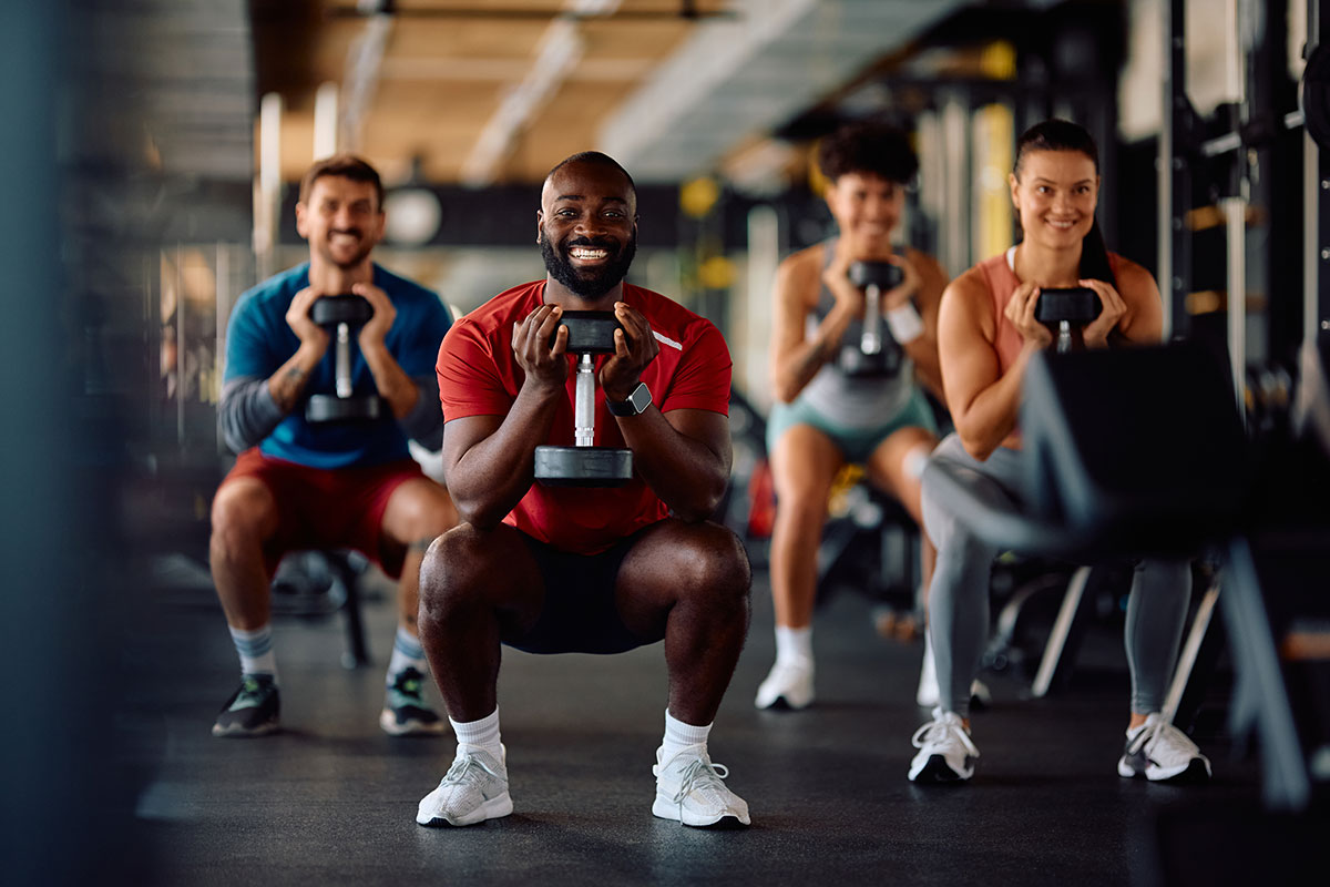 Group working out leg muscles